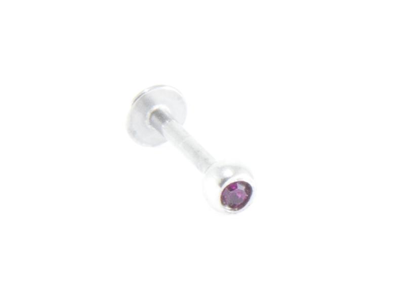 Labret-piercing med lila sten