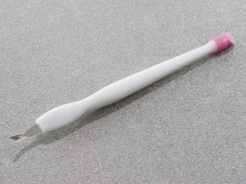 Nagelbandskniv med nagelbandspusher